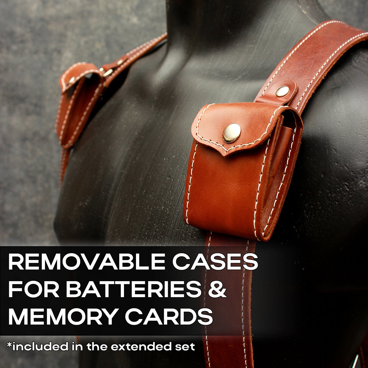 Dual camera strap (FULL LEATHER) with removable battery cases and a set of additional accessories.